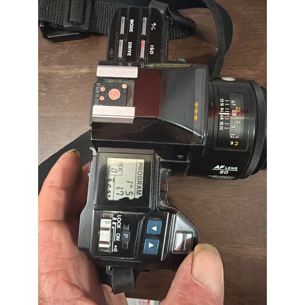 Minolta Maxxum 7000 AF 35mm SLR Camera with 50mm and Sigma 60-200mm Lense Manual